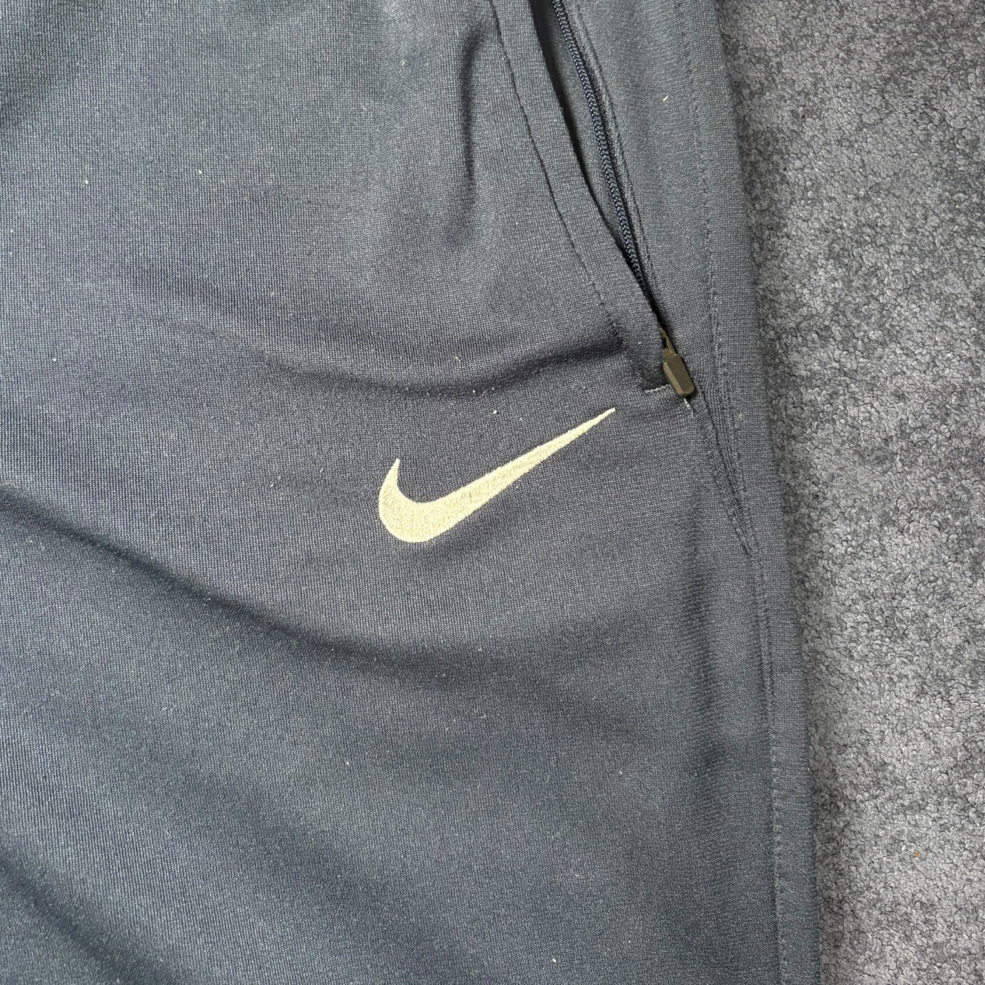 Nike track pants (M)
